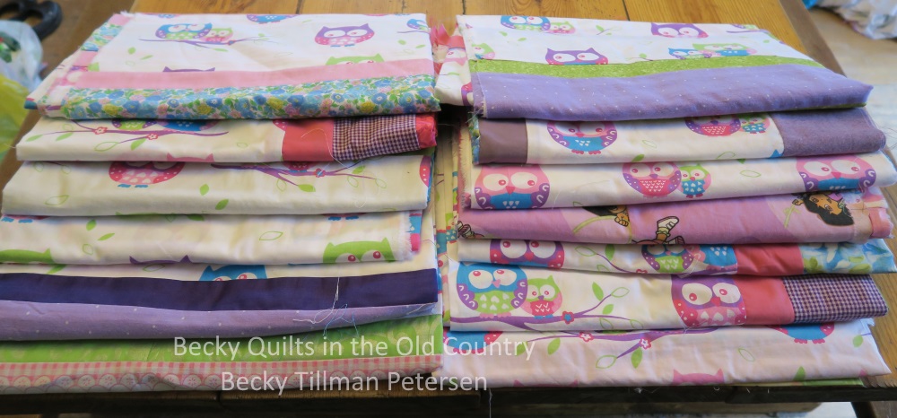 I have since finished this stack of tops, but I do tend to work in bunches - and this is a stack of "owl" themed tops I made. I got kind of sick of owls. However, last year at the give away, all of the owls were chosen. I've since made more so I'll have some for this year's big give away, whenever that is. I had hoped to have it around Easter time, but I wasn't ready by then.
