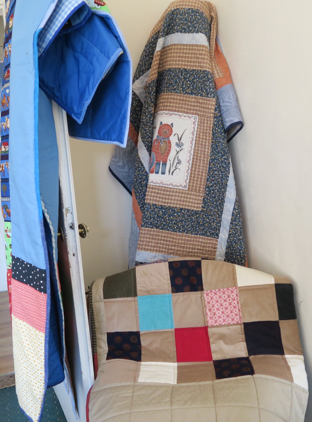 I had some beautiful brown corduroy donated to me. I couldn't think of what else to do with it, so I made a couple of these - out of all corduroy. The one above that is a pillow panel that I made into a sort of medallion quilt by adding borders until it was big enough.