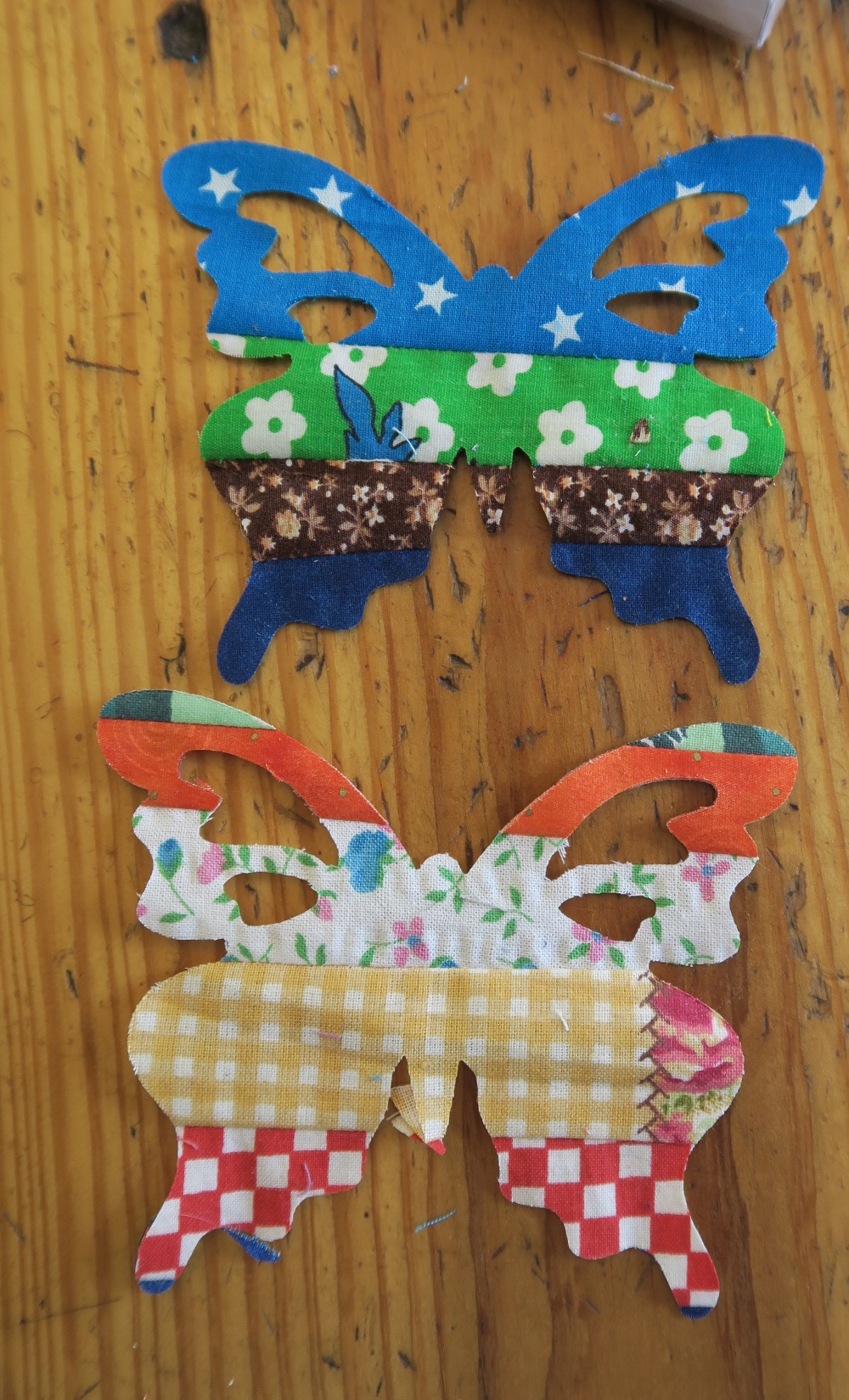 I got both of these butterflies out of that piece of fabric shown above going through the machine (I had to send it through 2x - one for each butterfly).
