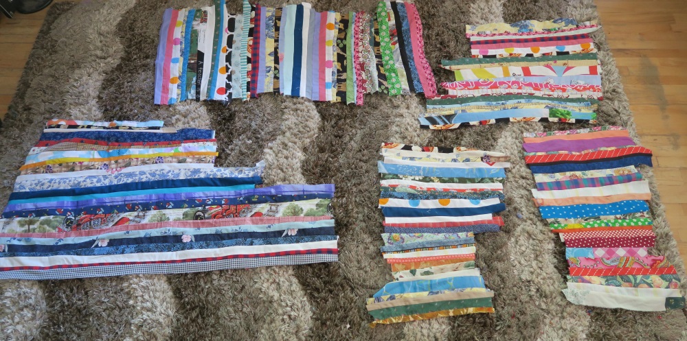 Do not be deceived. They are lying on my living room rug - That biggest piece of "made fabric" is about 36-40" long.