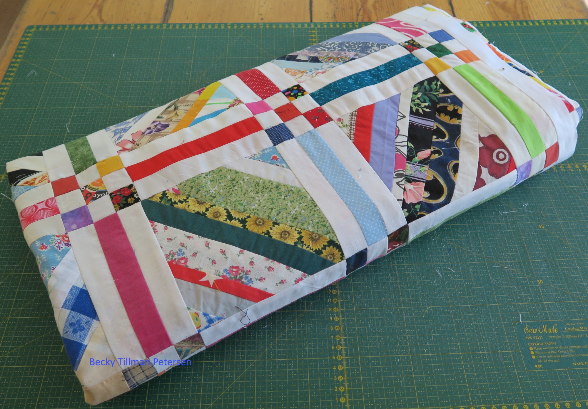It almost looks like a quilt roll here, but it's just a "folded top".. 