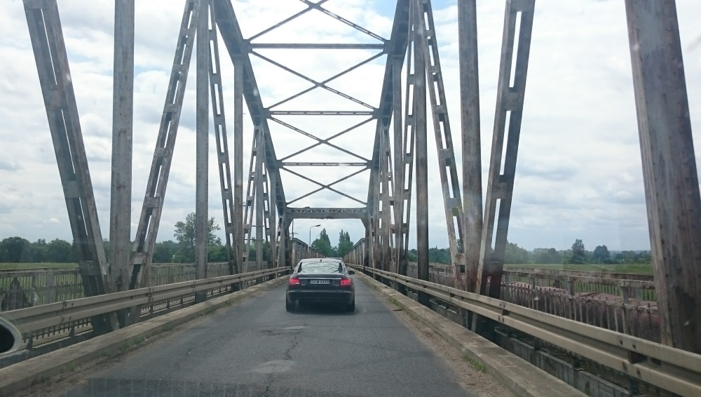 This picture picks up after we left the sewing machine repair place. We stayed on the freeway a lot - and the freeway, while fast, doesn't give you a lot of chances for great pictures! This bridge was picturesque. We waited in a line with a stoplight so we could take our turn to go across.