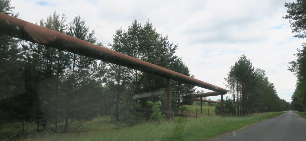 My husband said these pipes are holding hot air from a heating plant.