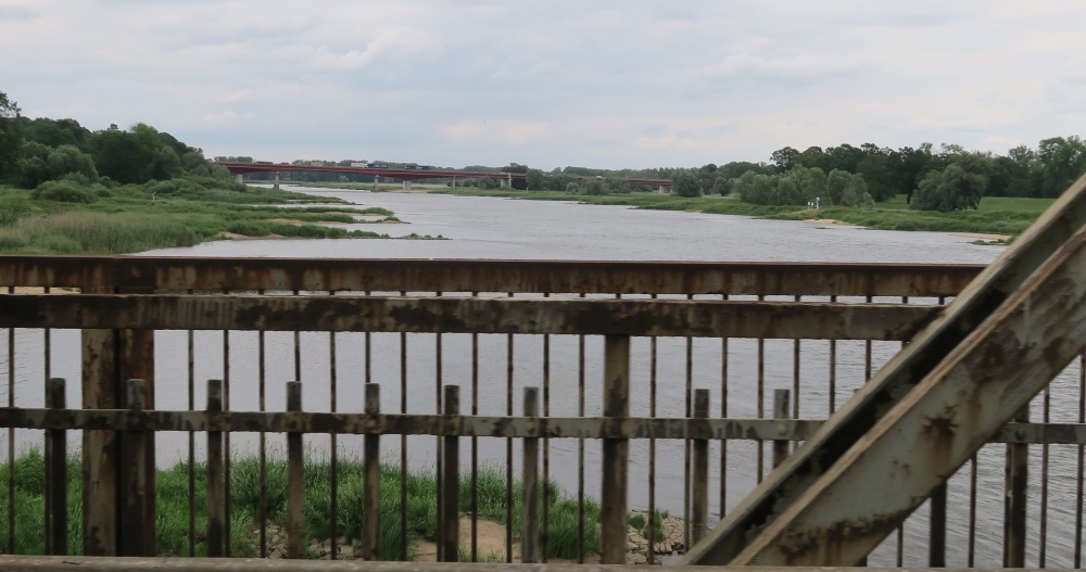 Going back towards the freeway, we had to go back over the one lane bridge. This time I tried to get the water. I think this was the Warta River.