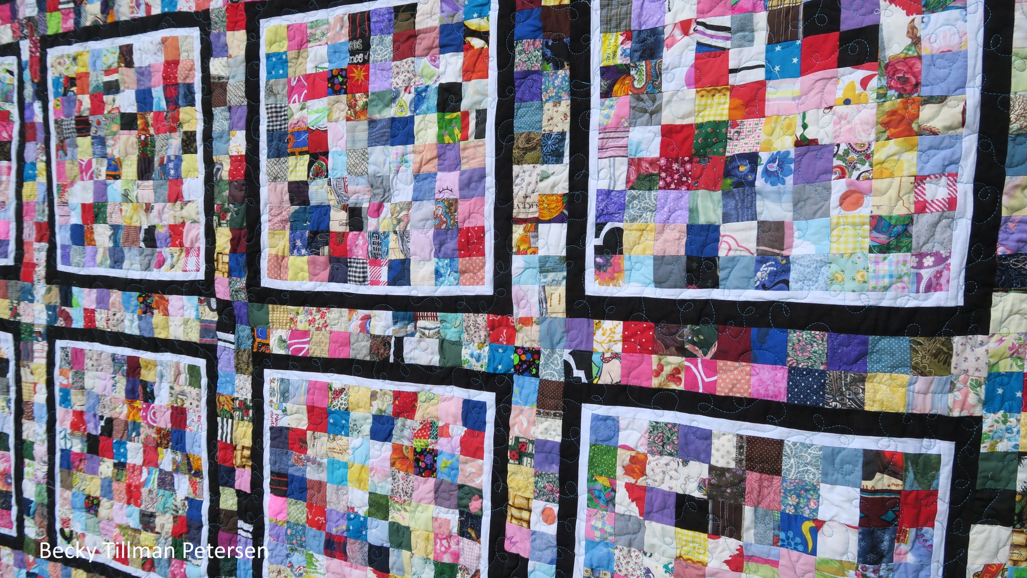 This angle gives you both a closer look at the fabrics used and the quilting.
