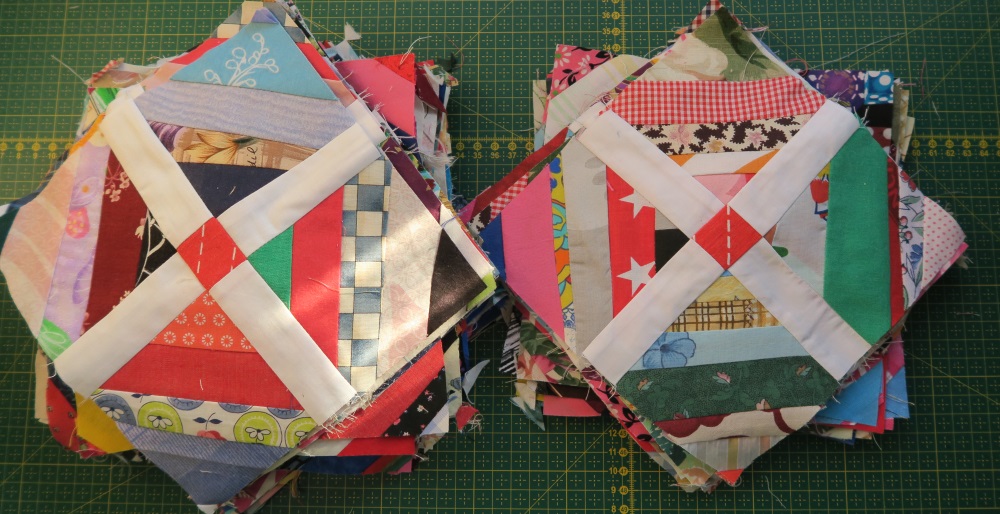 I need 72 for the layout of the next string quilt I have planned. I decided to focus on them and get them finished this weekend. Here they are - all done!