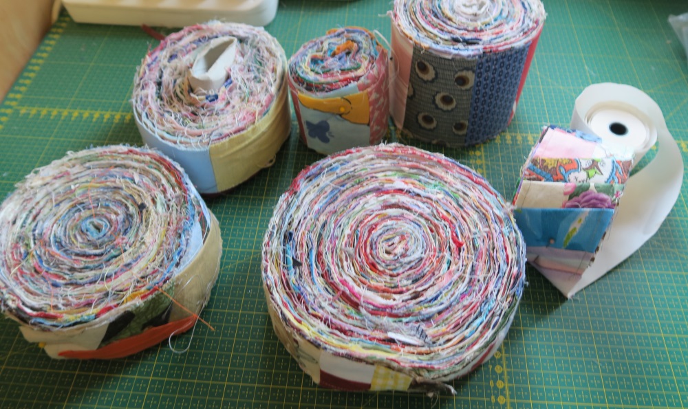 These are strips ready for me to use. The wider one in the back is almost 4" wide. The one on the far right is the one I worked on a little today.