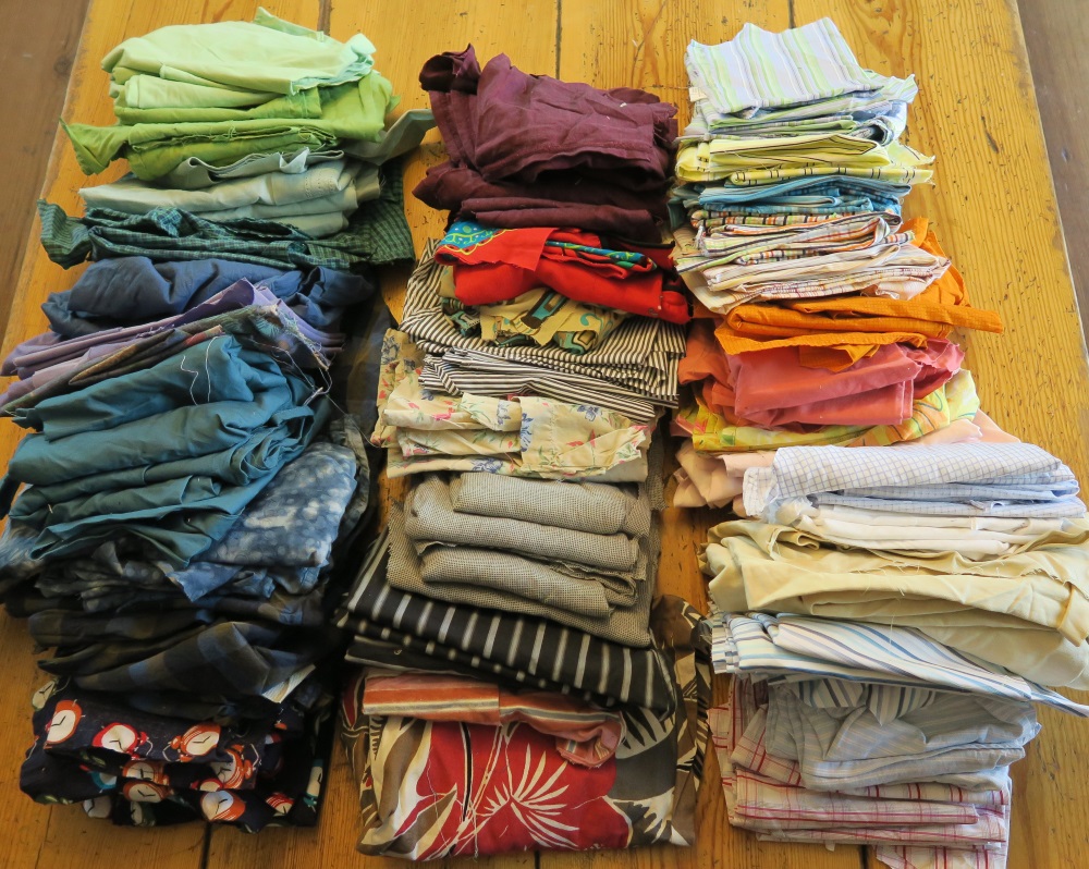 The good stuff! So much beautiful fabric here. It is all cut up and more or less ready to be used. I still need to sort it by color and put it in the appropriate bins. Oh yes, I guess I should just use it. Those bins are all pretty full. Guess I need to get busy on some "upcycled" projects soon.