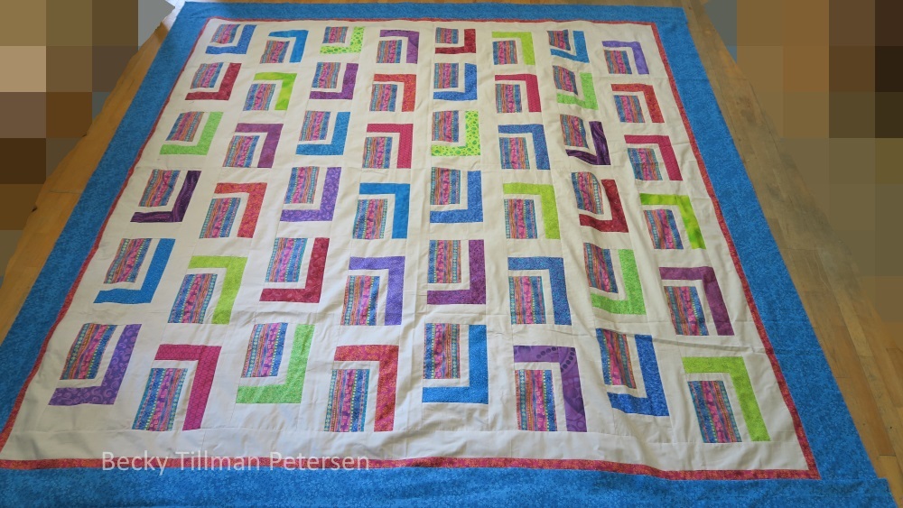 I chose coordinating fabrics from my stash and made this top using the scrubs as the inspiration from which I worked.