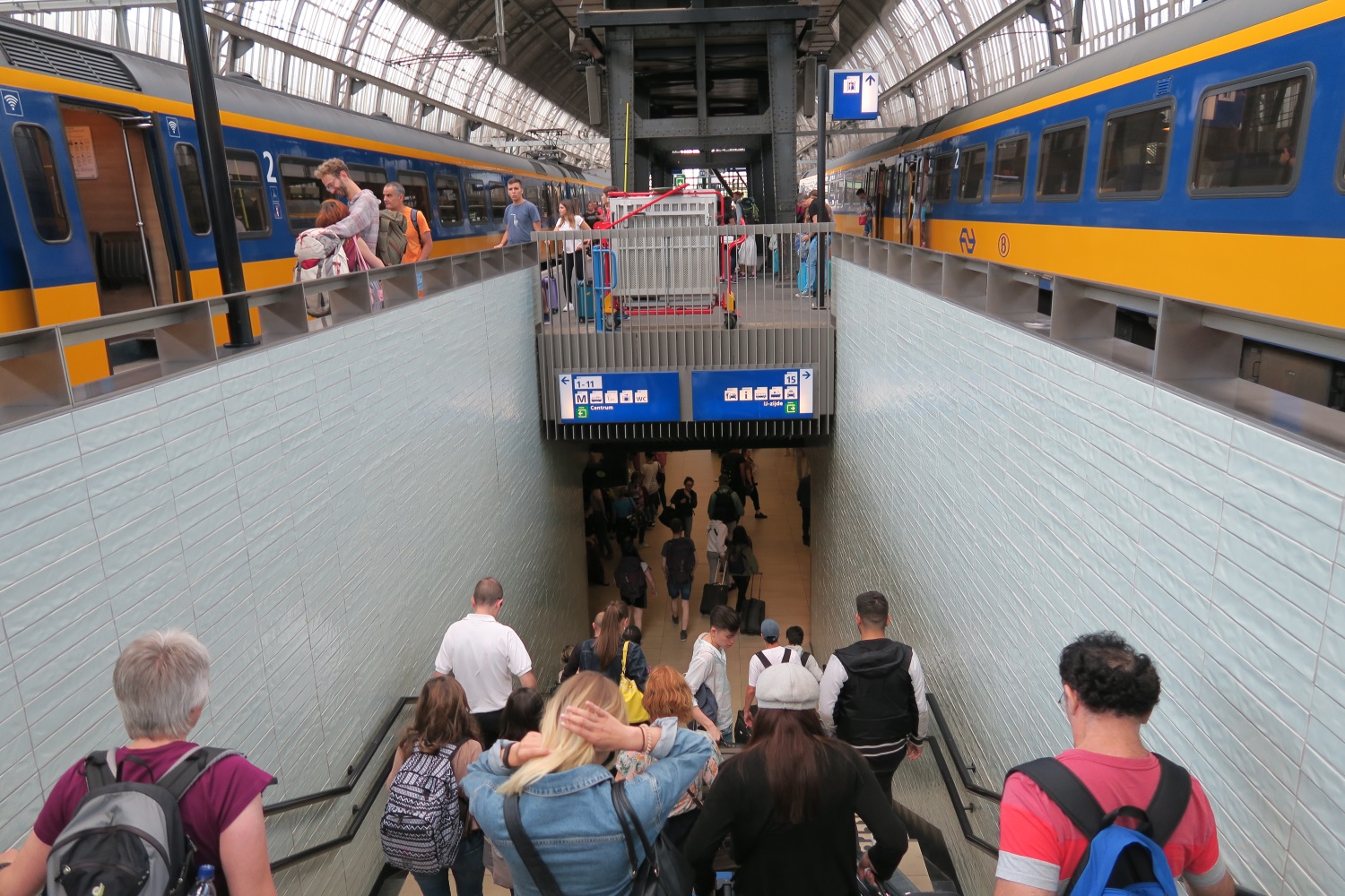 As you get out of the train, you head underground to get to the other side of the train tracks.