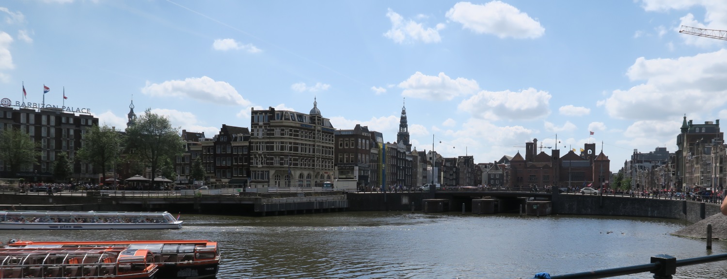 Looking out towards the city center, we noticed a lot of these little cruise boats and knowing how tired we were, I suggested it as something to do. I couldn't see ourselves walking and walking. We had been up since Thurs. am and this was Friday afternoon.