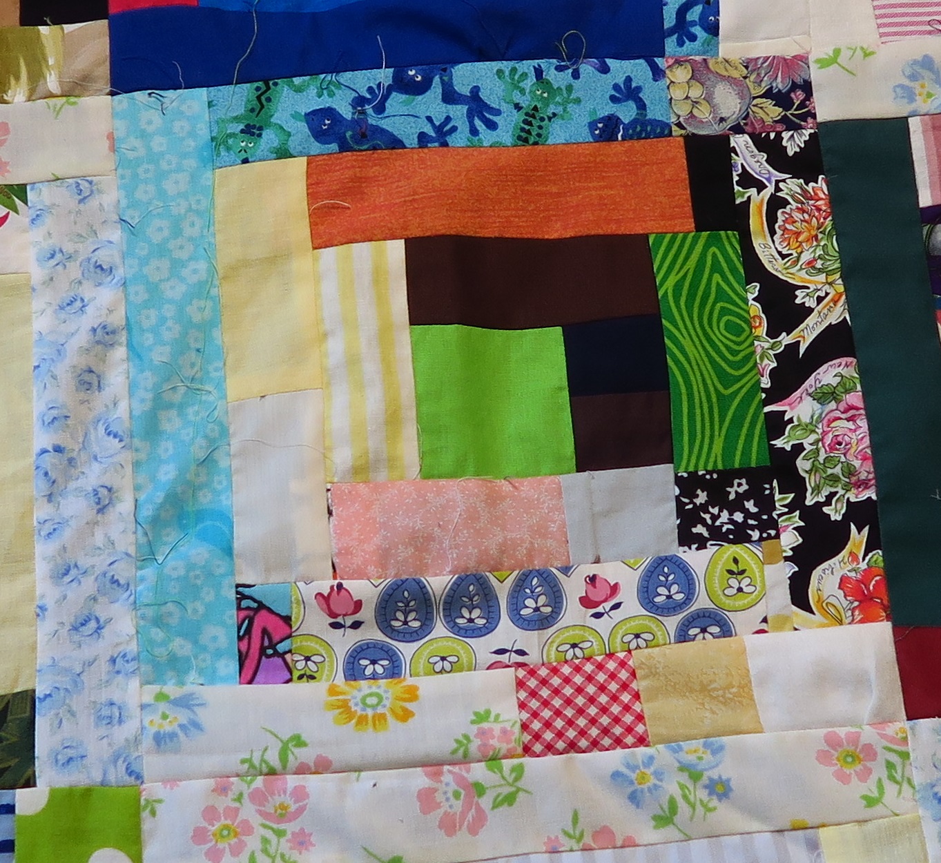 A close up of one of the blocks. You can see the pieced together logs in some of the rounds.