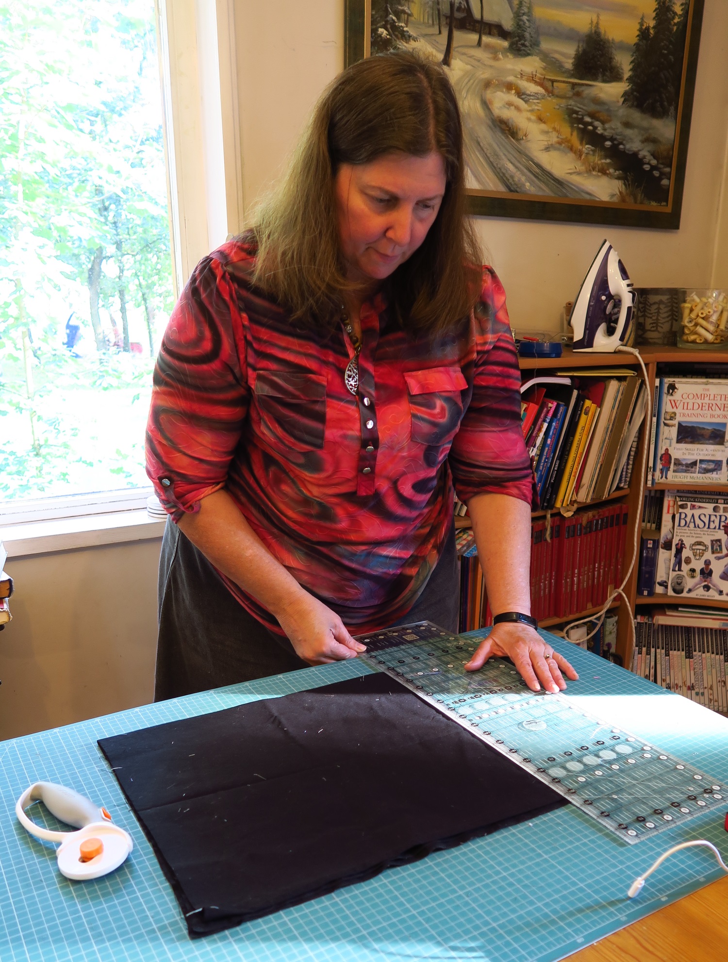 Cutting the binding.