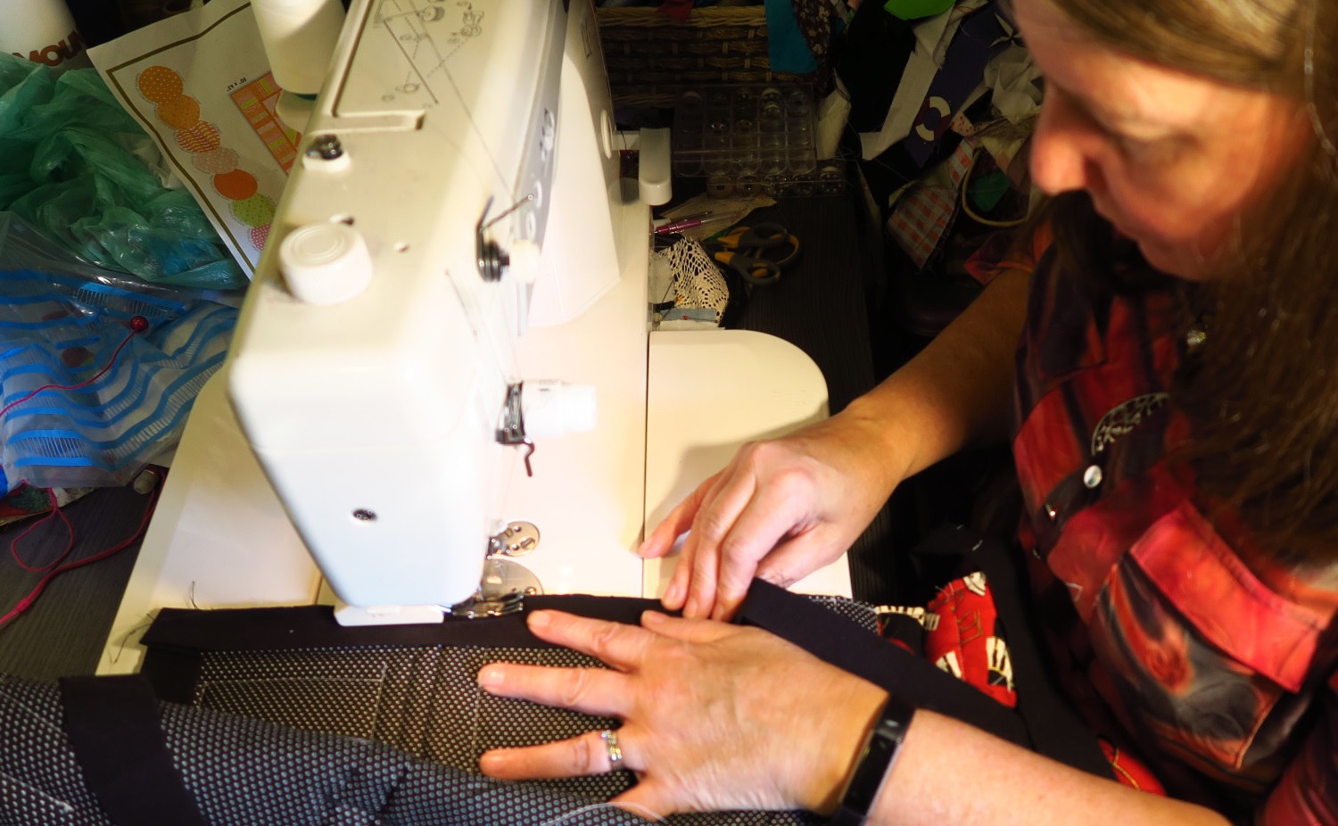 She decided she likes this Janome 1600P straight stitch machine. She used my other machine for the applique, but this is working pretty well for all her piecing work! It's smooth, quiet and runs like a dream.