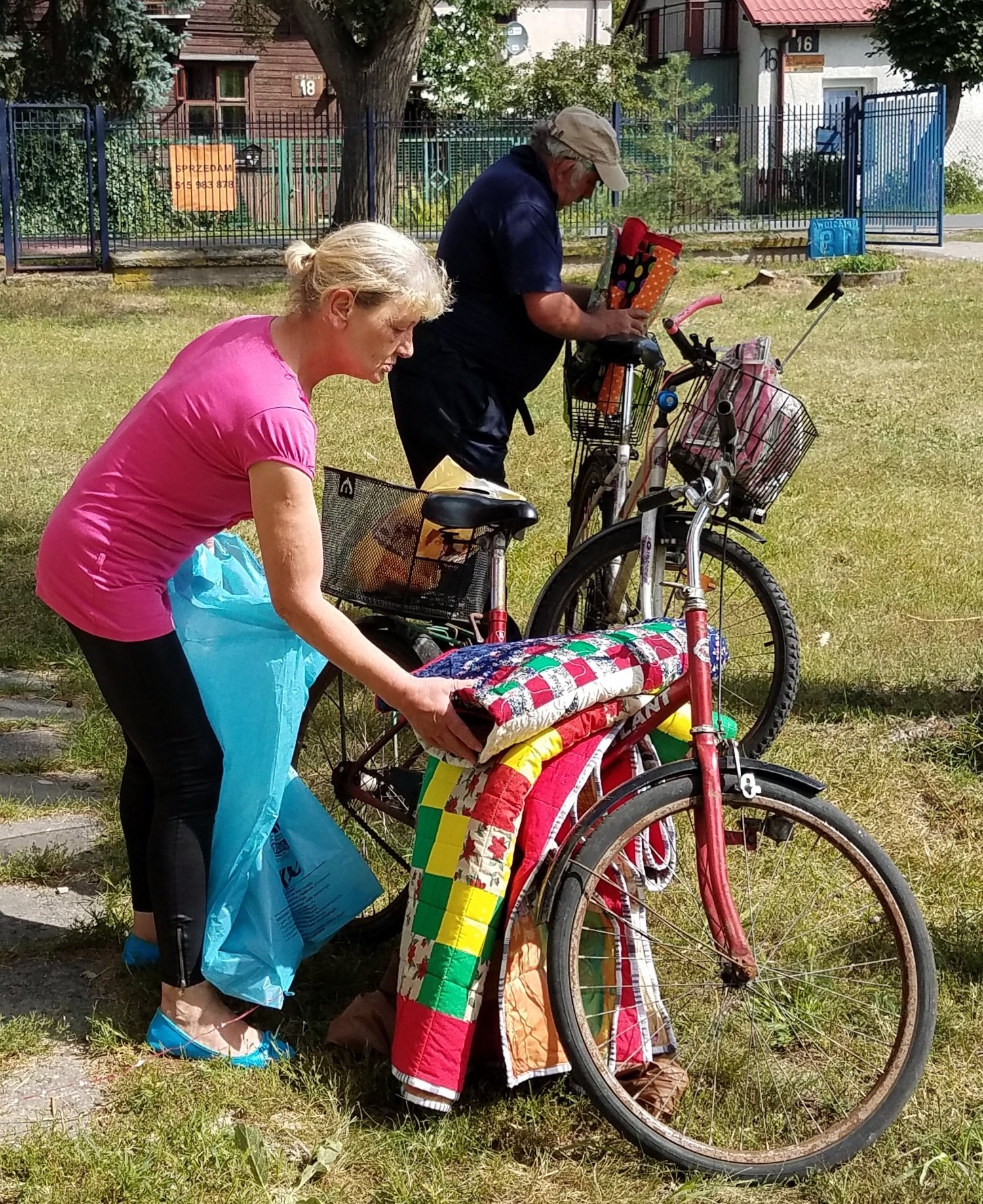 Here are some people packing up their quilts on their bikes. This was the most common form of transportation we saw today.