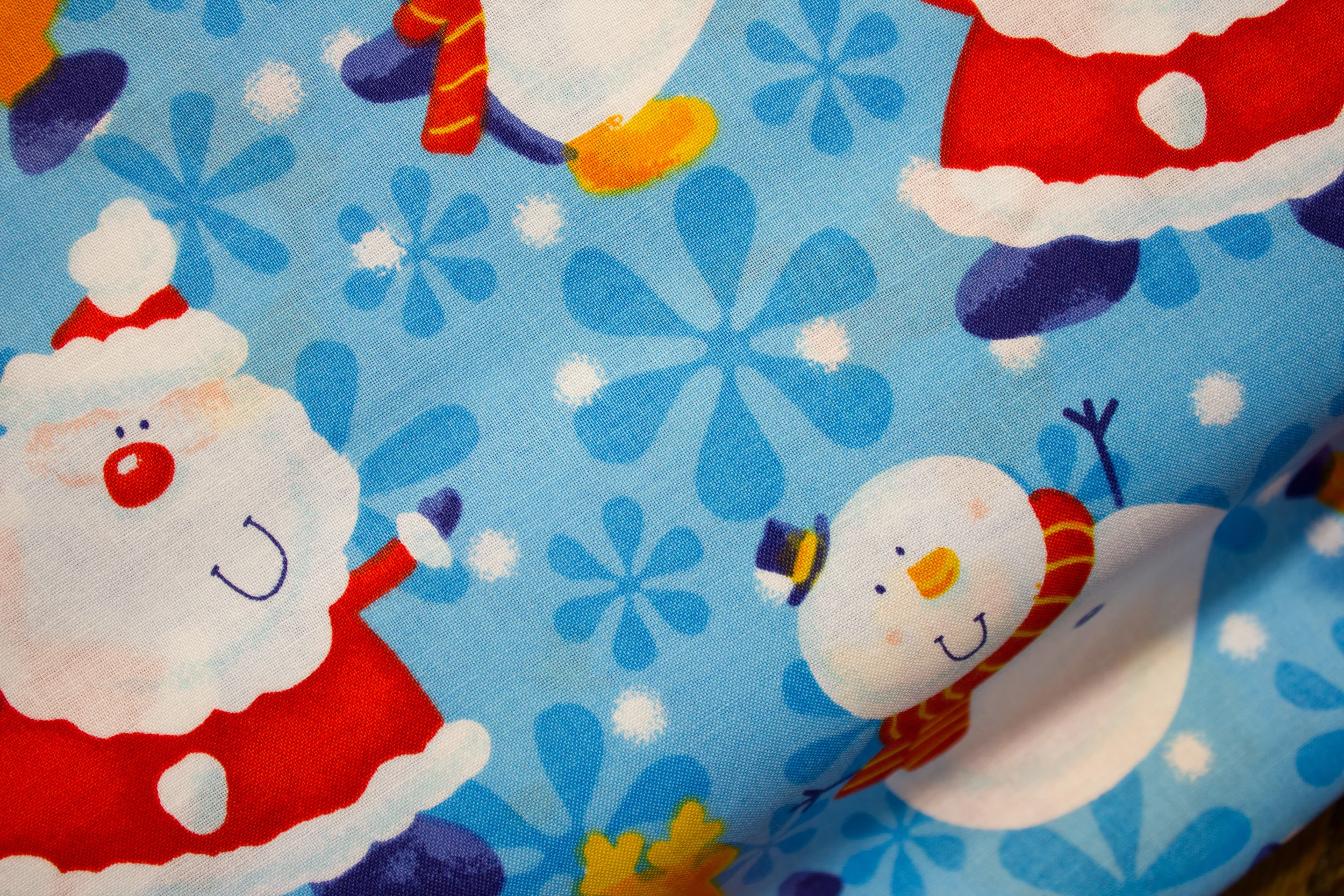 Snow Play on Blue Background