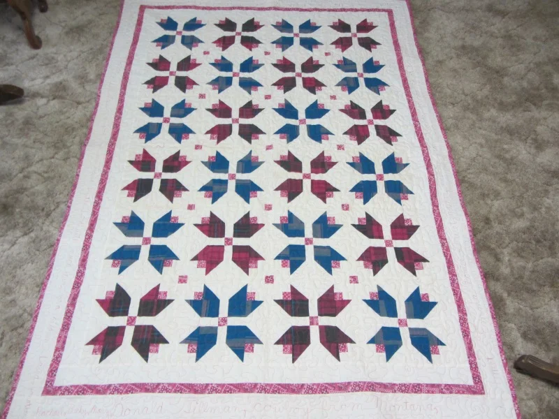 When I quilted this one for mom, I quilted their life together in a sort of Cliff's Notes version around the outside.