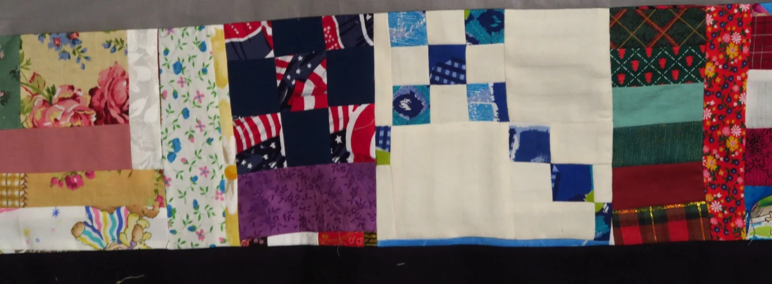 This part of a chain blocks is something I decided not to make. The patriotic block next to it was a 9 patch that originally went into the corner of a top I made earlier this year. I hated the look and took this out and put in a plain navy square instead.