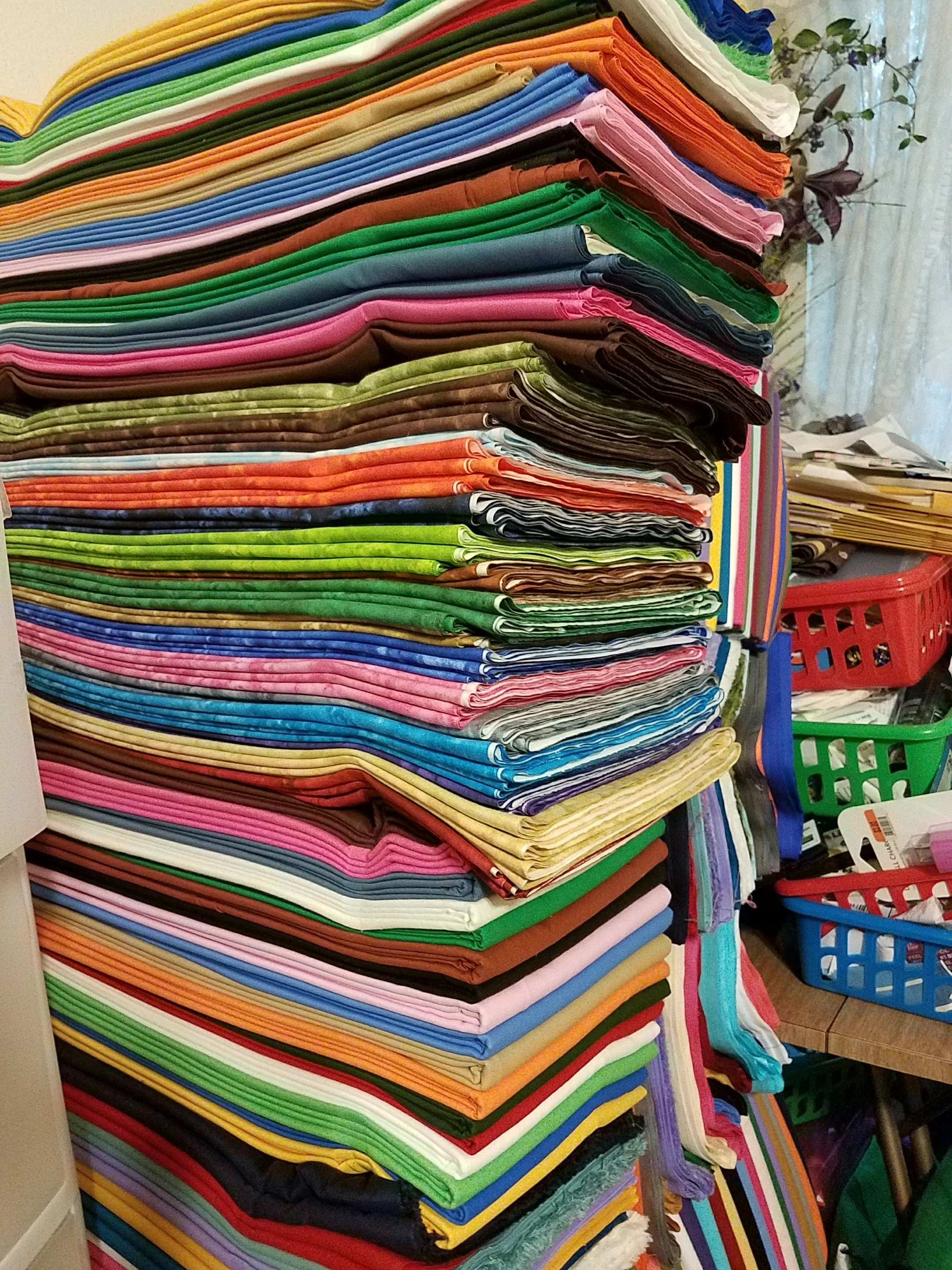 I know there is some fabric mixed in here that is not solid, but this is piled pretty high. I left the picture uncropped so you can could see more solids peeking around the back as well.