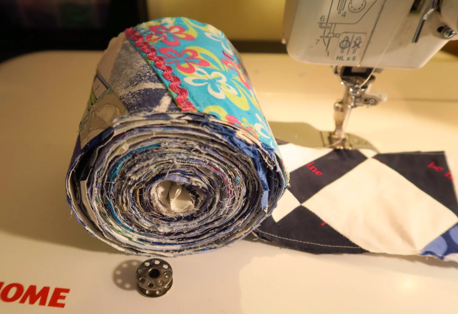 I left the bobbin there so you could see the size of the roll I made. Thankfully it was enough to make all of these blocks today. I already had enough of the narrower tape sewn up.