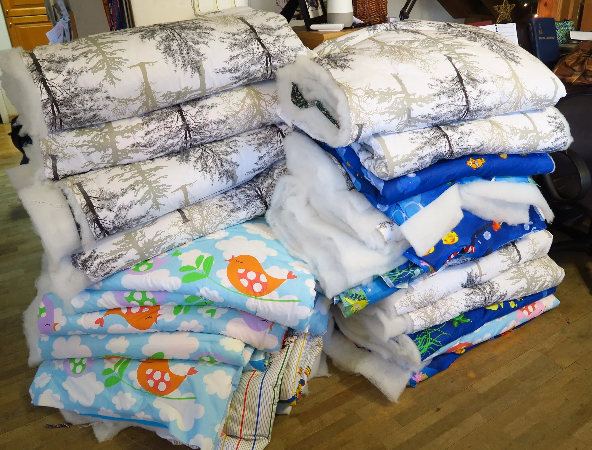 1 charity quilts pile of 23.jpg
