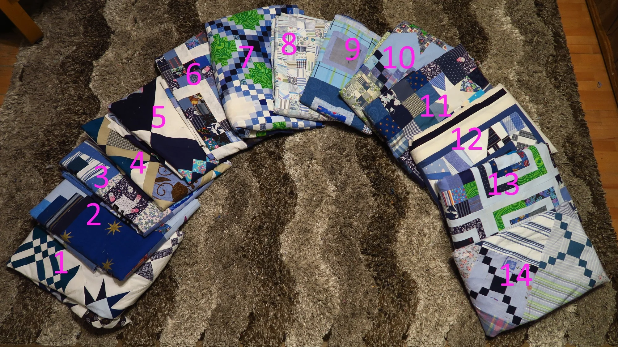 From left: 1 - Starring Monkey Wrenches, 2 - Periscope, 3 - Premium Labels, 4 - Peek-A-Boo, 5 - Granny's Checkerboard, 6- Scrappy Rail Fence, 7 - Triple Irish Delight, 8 - Made Ya Look - at Blues, 9 - Frisky Boxes, 10 - Double Star Delight, 11 - Starry Night, 12 - All Crumbled Up, 13 - TagAlong, 14 - Simple Chains.