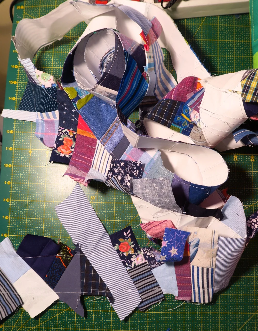 Before trimming. I added about 2 more yards of scraps to this tape. While it's not in my plan to use it at this time, I'll come up with something if I fill up the whole roll of paper tape with blue scraps.