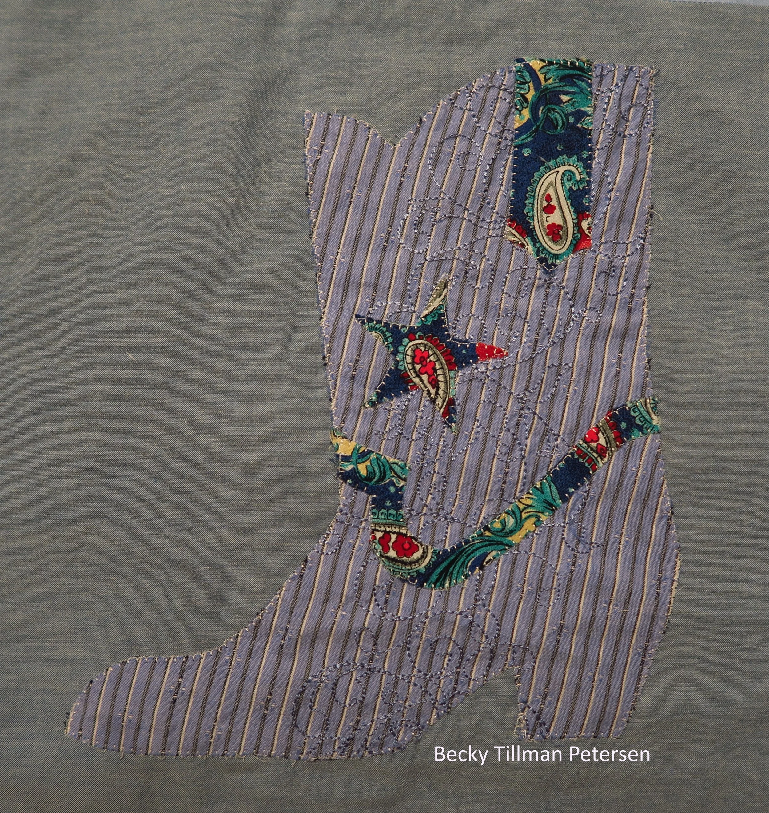 The background fabric is embroidered. I thought it very nice so I made it into this boot.