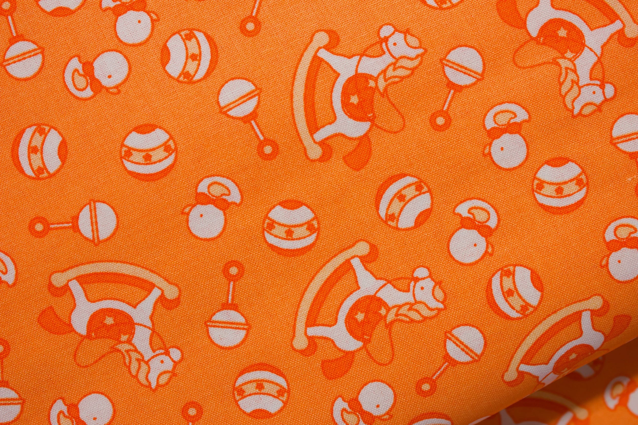 Baby Talk: Rocking Horses & Duckies in Orange and White