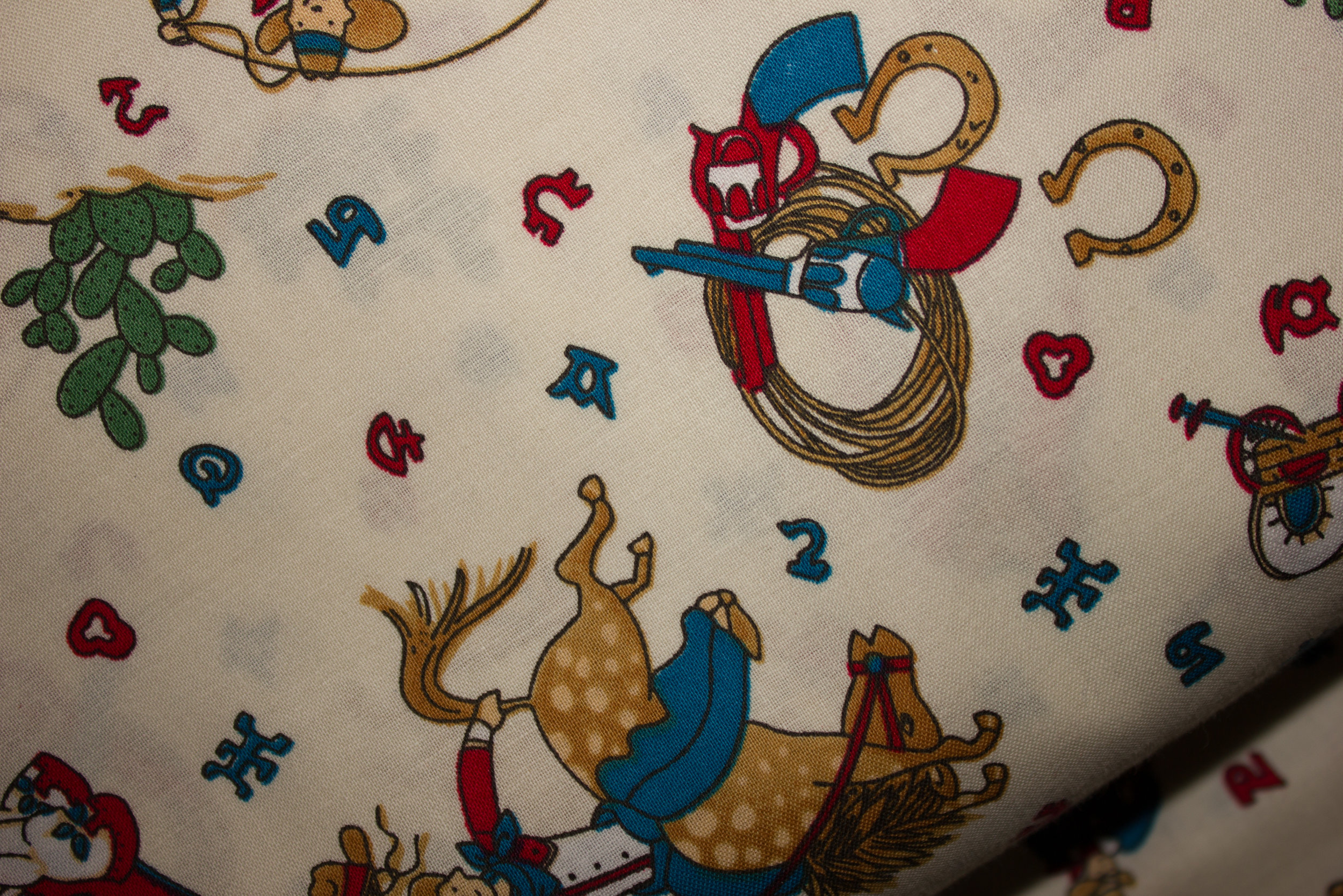 Mexican Fiesta with Cowboys by Concord House quilt fabric