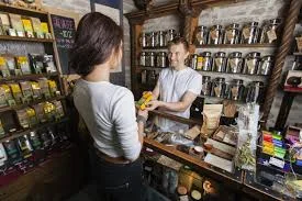 The Polish tradition originated with the communist regime. Shopper buying products in store.
