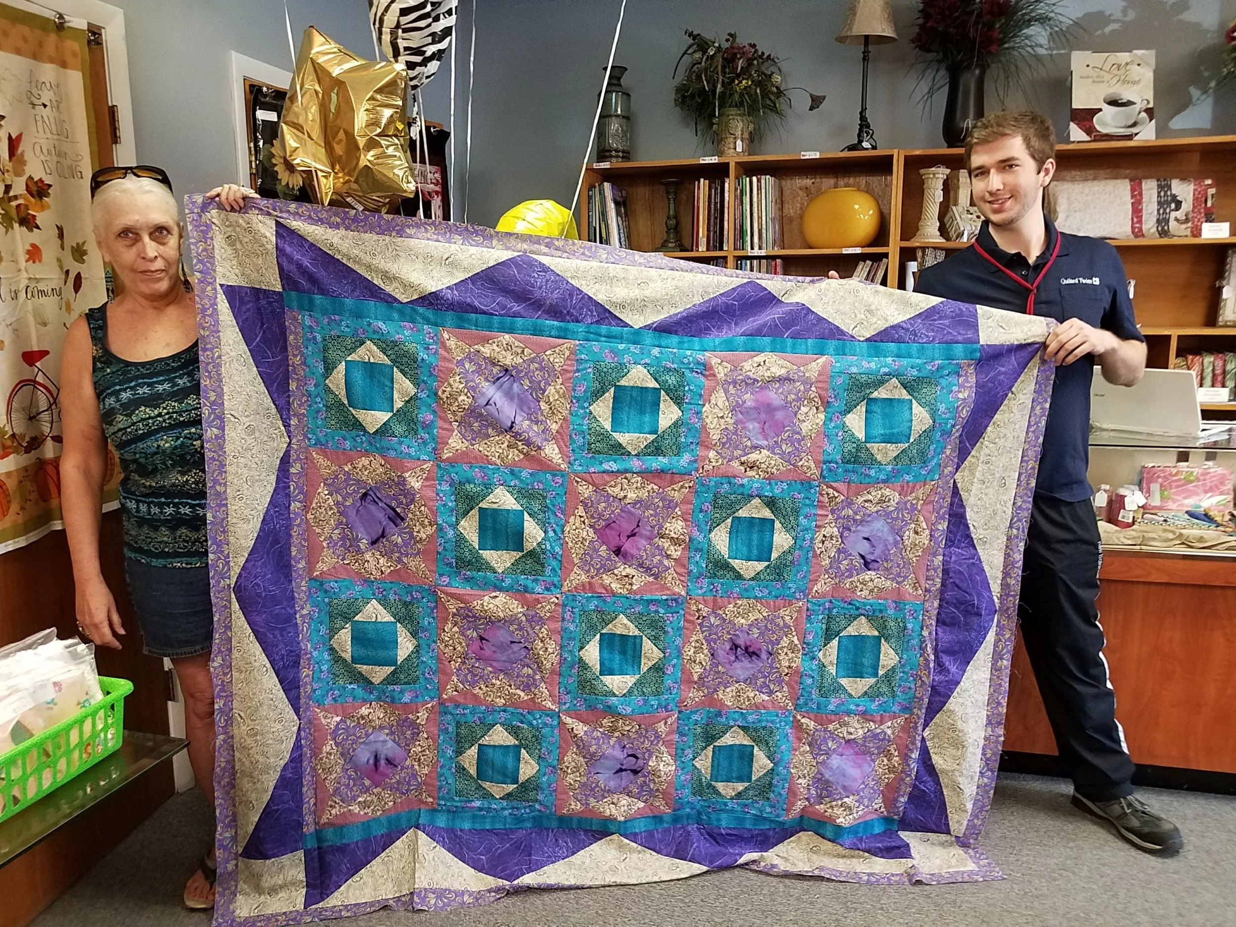 On 5.10.18 Helen Newcombe (below) brought in a beautifully blue quilt top she had made. Our fabric is the turquoise blender fabric. It's for sale here:
