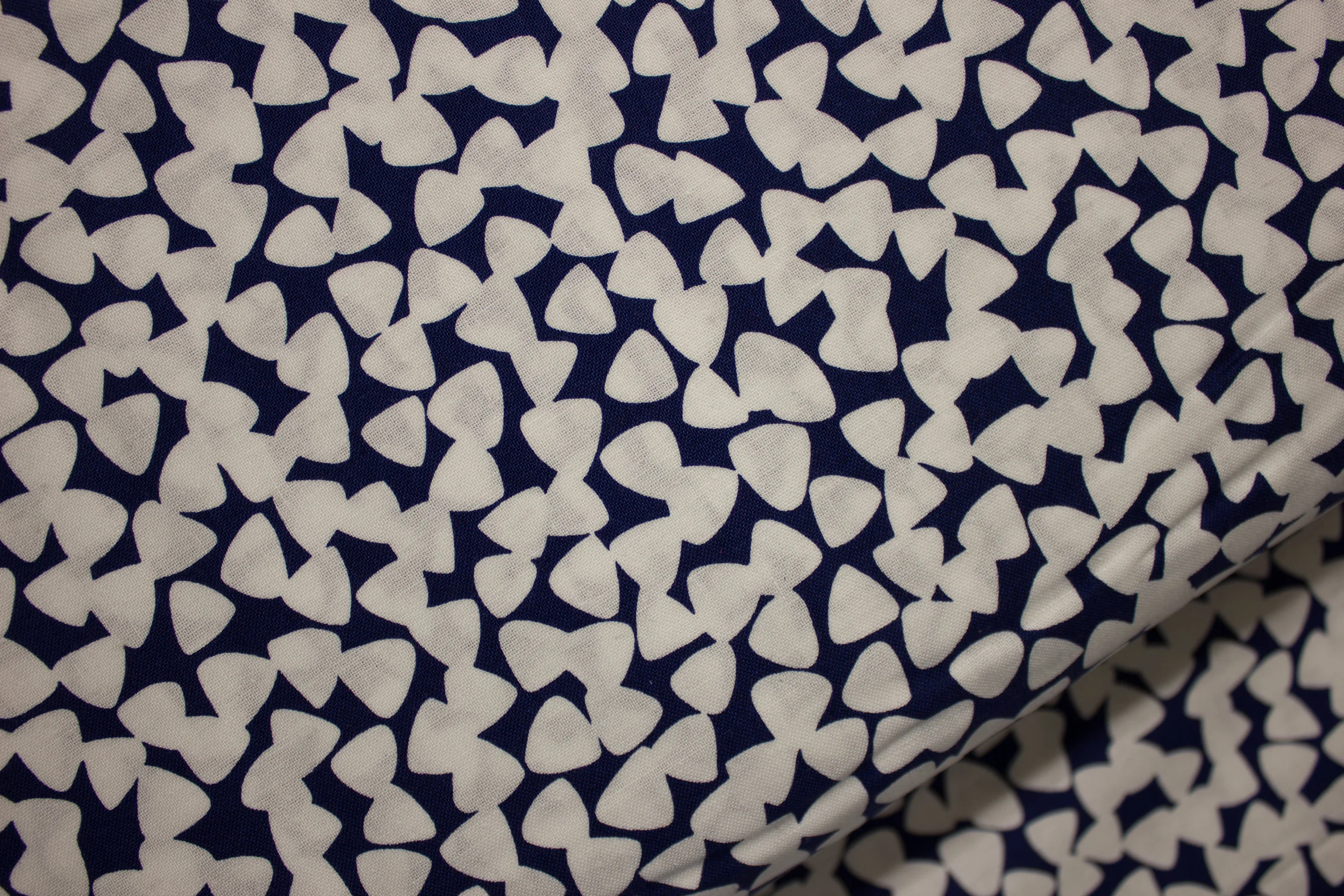 Blue with White Triangles: Tiny Guitar Picks by Michael Miller