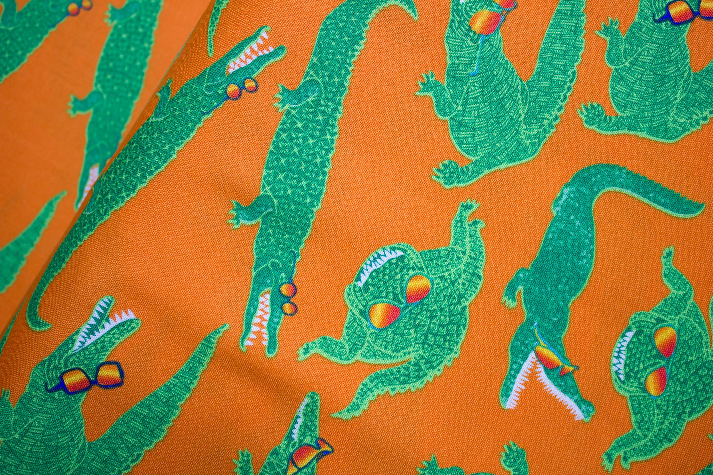 Rockin' Crocs - Crocodiles on Orange - for Kanvas Studios discount quilting fabric