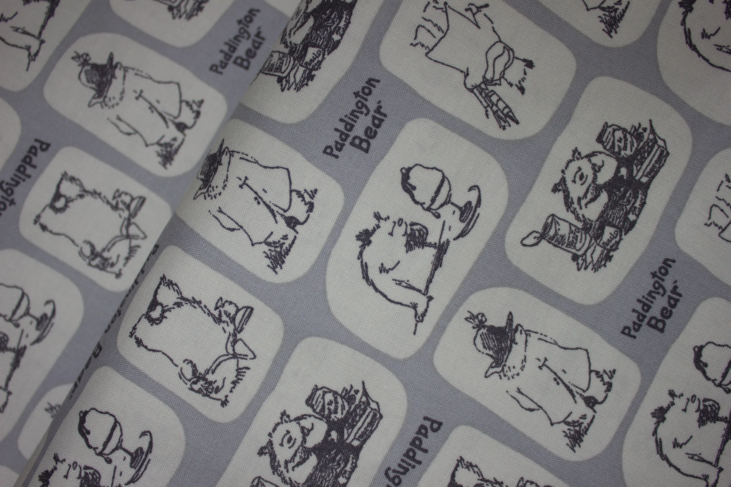 Paddington Bear Scenes on Gray by Camelot Fabrics
