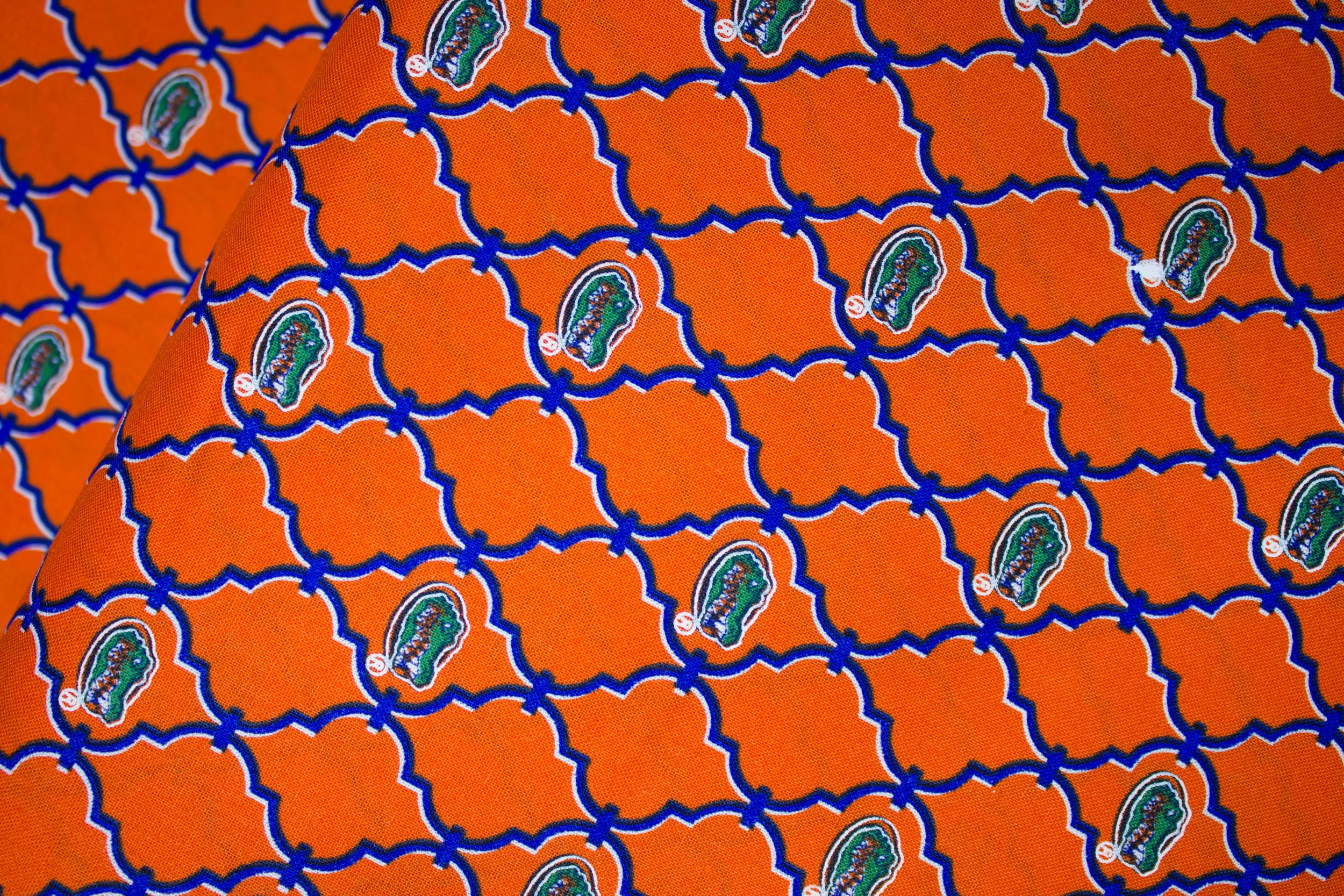 Gator Head in the Middle of Orange Quatrefoil - University of Florida Gators - Sykel Enterprises - Licensed Prints discount quilting fabric