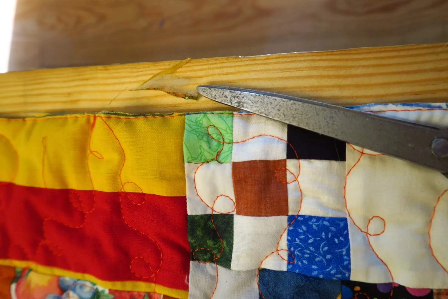 I used scissors on that first edge. The other three? I used a rotary cutter and mat.