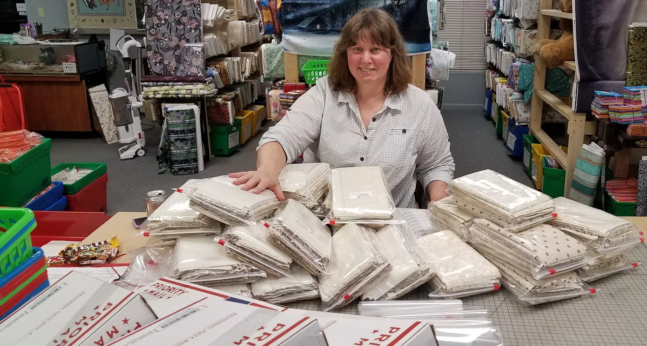Here I am working on “neutrals” fabric packs that we are included.
