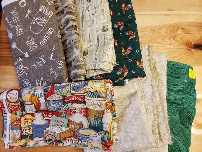 I’m going to make this fabric in front the featured fabric. This one is going to be a queen size quilt. I’ll make up some pillow cases or shams or decorative pillows when I’m finished with the main quilt - will see how much fabric I have left.