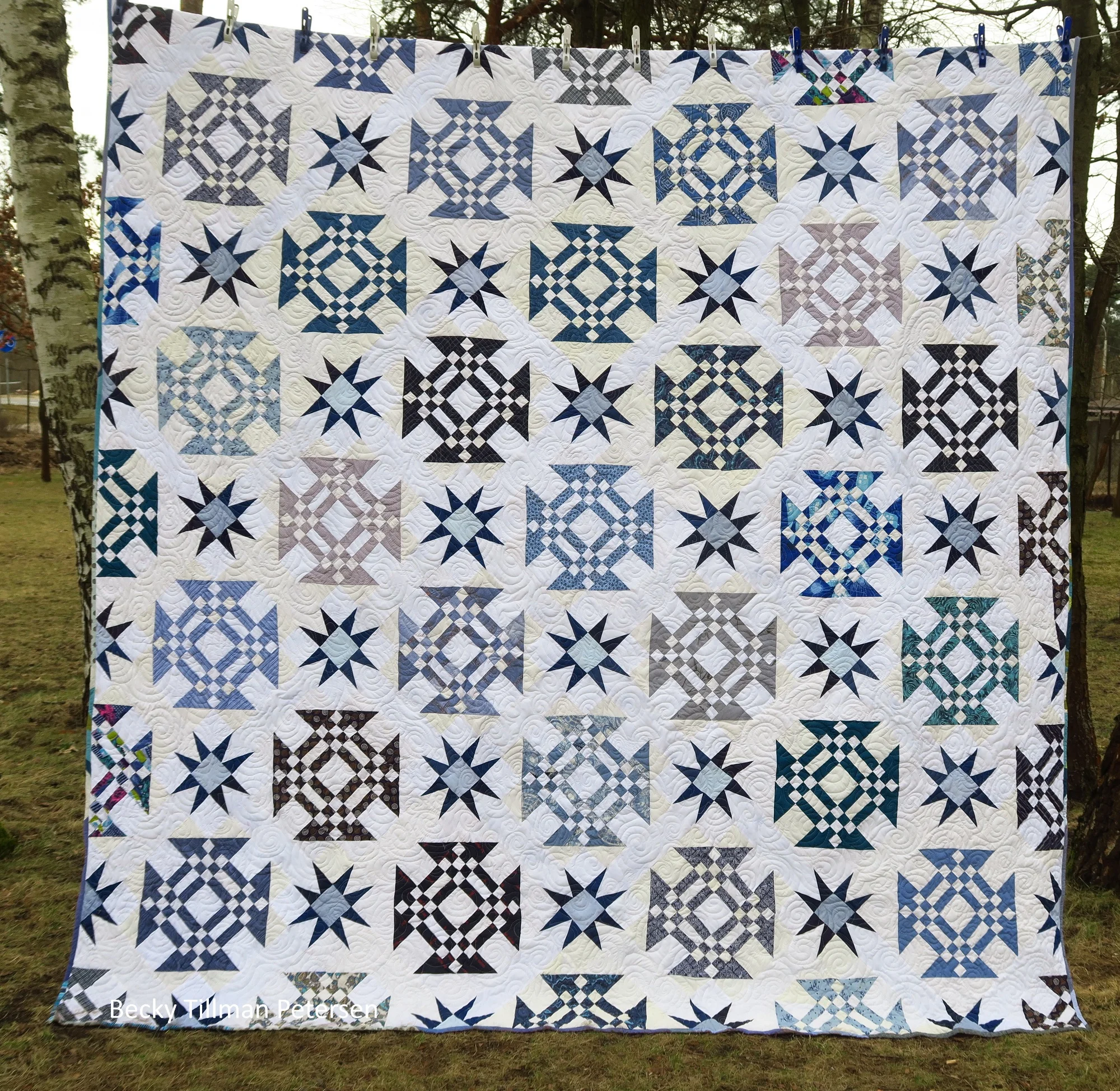 Design - a classic block put on point with a star sashing in the middle Inspired by - a block called Goose in the Barn Door (if I remember right - it’s 9 patches and rail fence blocks) - combined with my desire to try a blue/white quilt Regrets - none, but I didn’t realize that the whites were so different til I took it outside to get a picture after it was all finished. My lighting inside my house does not show up these differences like this. This was the first in my upcycled blues series - all fabrics are second hand - shirts, blouses, bedding, etc.