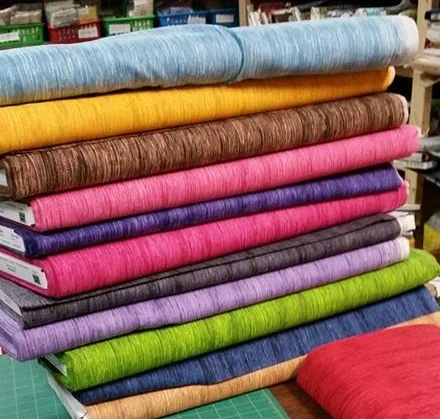 Some of the woven fabrics that the Quilted Twins carries!