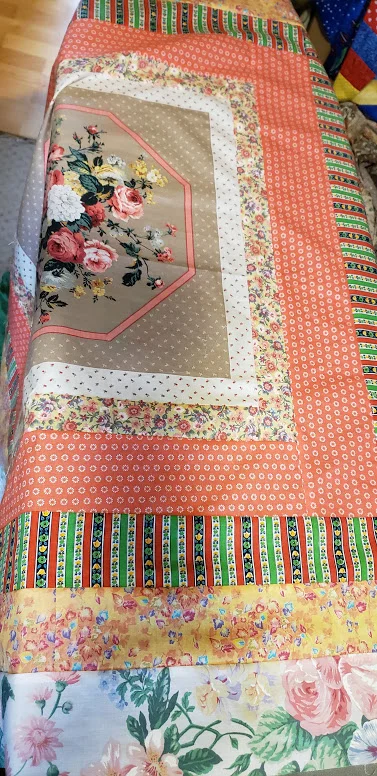 This is my Kaffe Fassett wanna-be. That’s funny actually. I don’t have that many fabrics with the glorious colors he has. But I’ve decided to use what I have! Hopefully it will make someone smile!