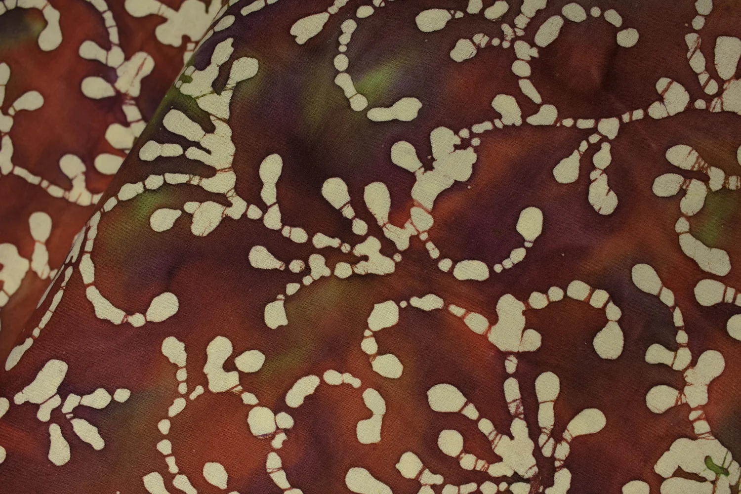 Brown, Purple, Red, and Green with Pale Green Swirls: Quilter's Batiks