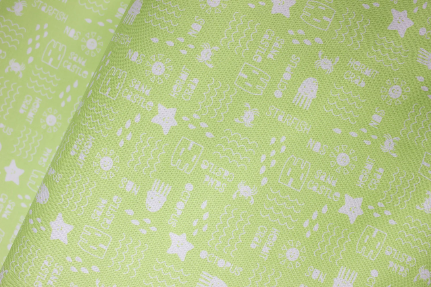 Spring Green with White Beach Things and Words: Chasing Waves for Marcus Fabrics