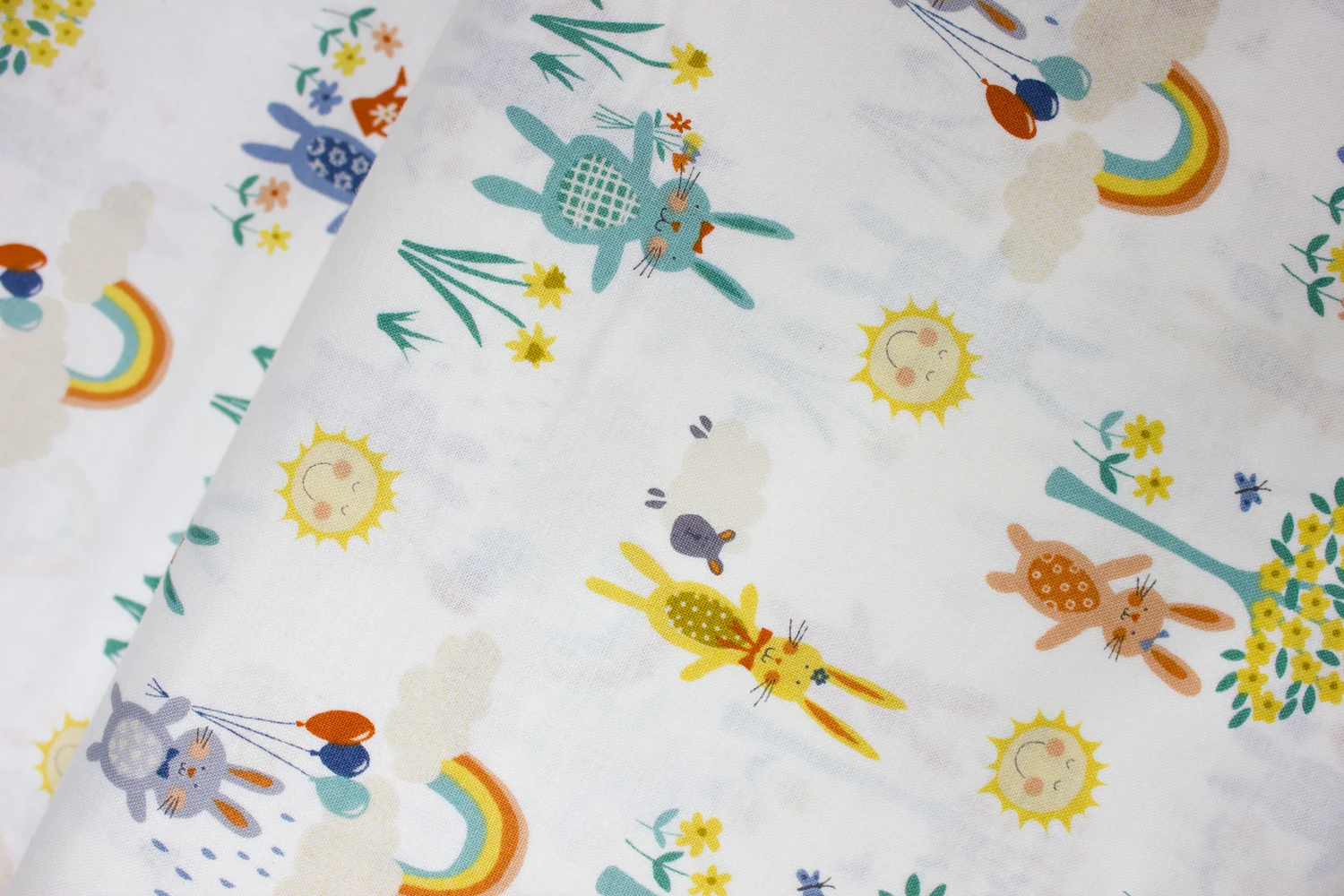 Colorful Bunnies in Springtime on White: Counting Sheep by Makower UK