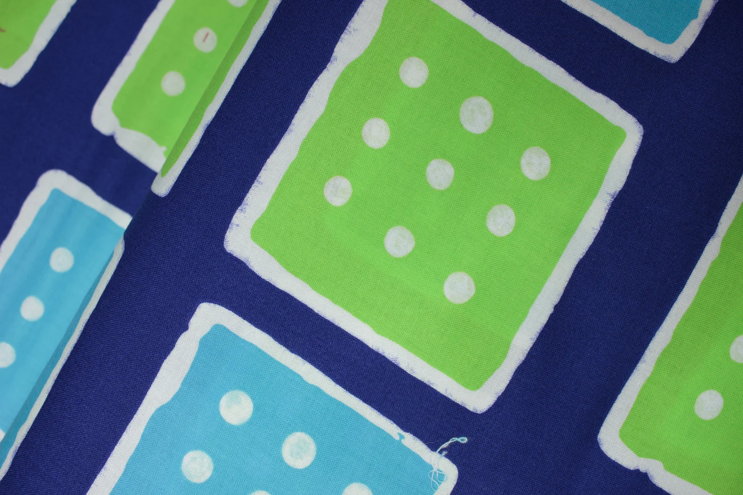 Dark Blue with Lighter Blue, Green, and White Squares with Dots: Urban Landscapes for Clothworks