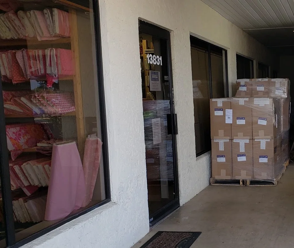 We can park these pallets in front of a window while we bring it into the building.