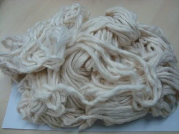 Some waste which is called cotton roving yarn. You can see how much thinner it is than the above sliver.
