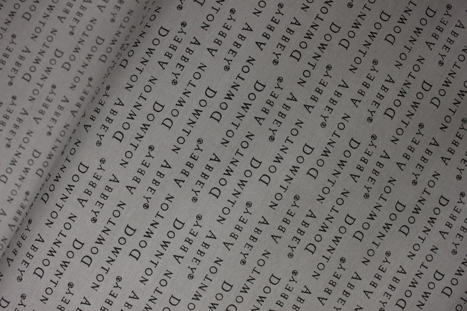 Downton Abby: Words in a row on Gray - by Andover Fabrics