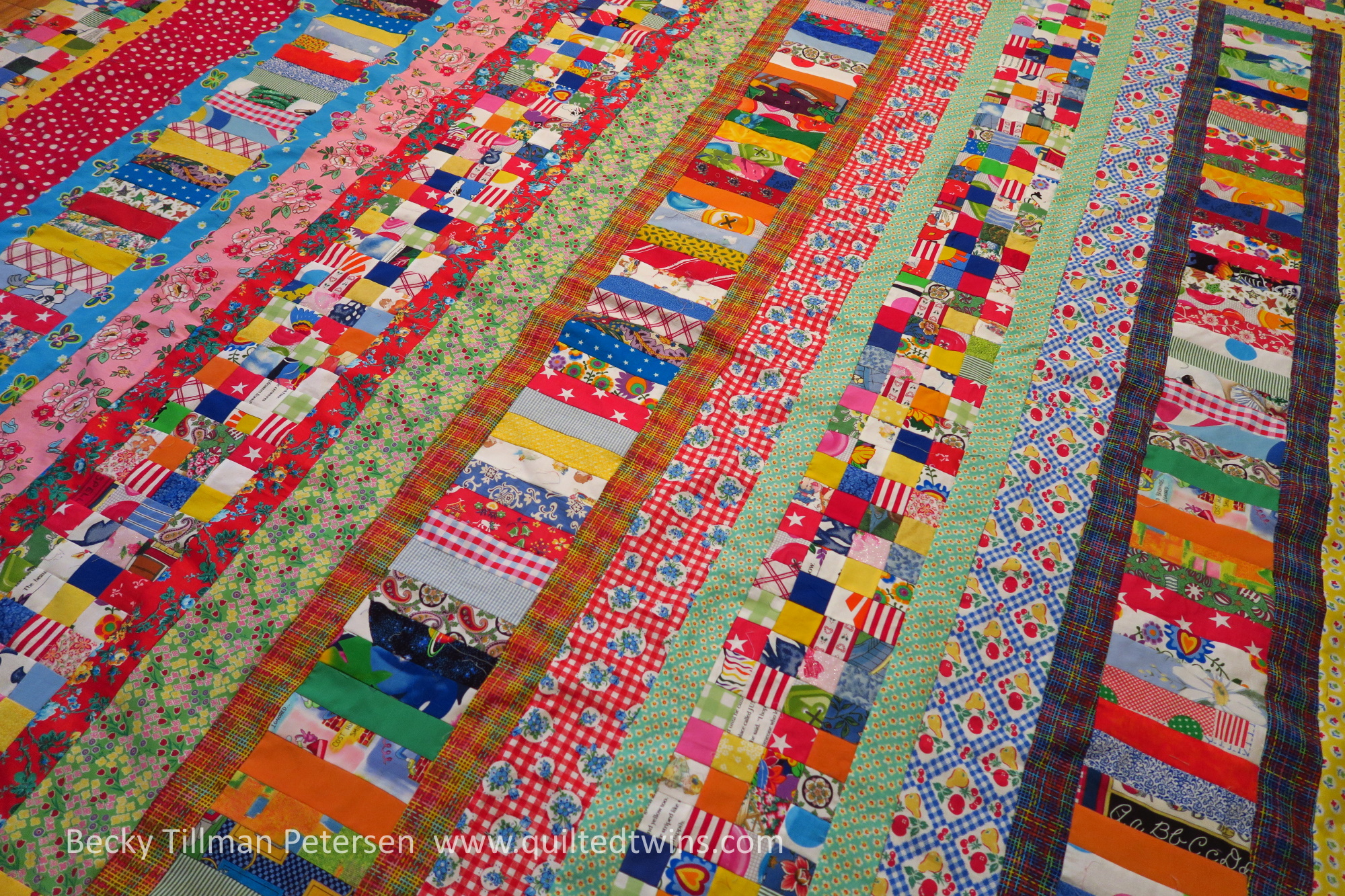 "Not-so-Quick Strippie" - # 77 2" strips and squares top finished